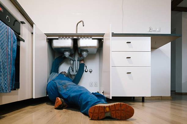 Professional Emergency Plumber technician working in Bynum, NC